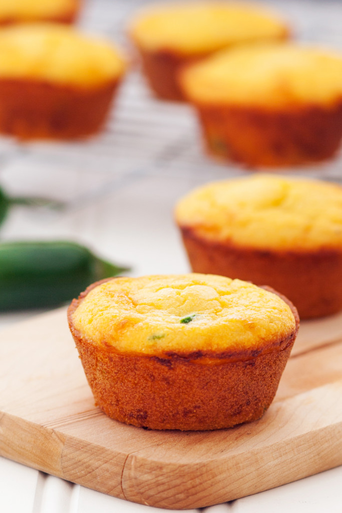 Jalapeño cheddar cornbread muffins. Crackly exterior, ultra-moist interior, and a punch of cheesy and jalapeño-y flavor! 