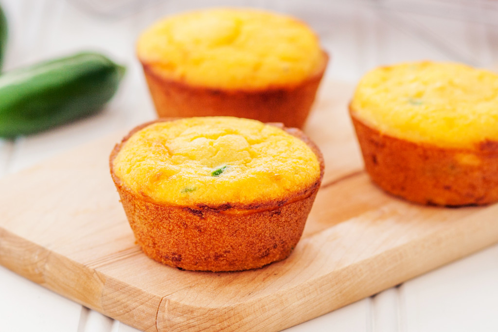 Jalapeño cheddar cornbread muffins. Crackly exterior, ultra-moist interior, and a punch of cheesy and jalapeño-y flavor! 