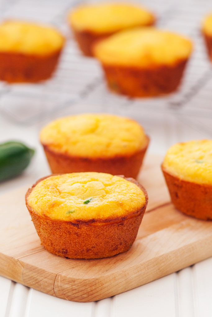 Jalapeño cheddar cornbread muffins. Crackly exterior, ultra-moist interior, and a punch of cheesy and jalapeño-y flavor! 