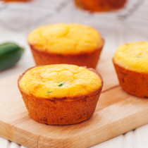 Jalapeño-cheddar cornbread muffins. Crackly exterior, ultra-moist interior, and a punch of cheesy and jalapeño-y flavor!