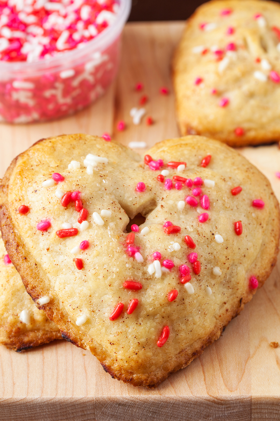 These heart apple hand pies are completely irresistible with their utterly flaky crust and scrumptious cinnamon and apple filling.