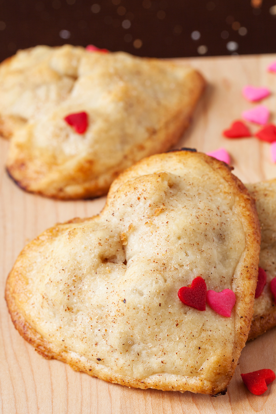 These heart apple hand pies are completely irresistible with their utterly flaky crust and scrumptious cinnamon and apple filling.