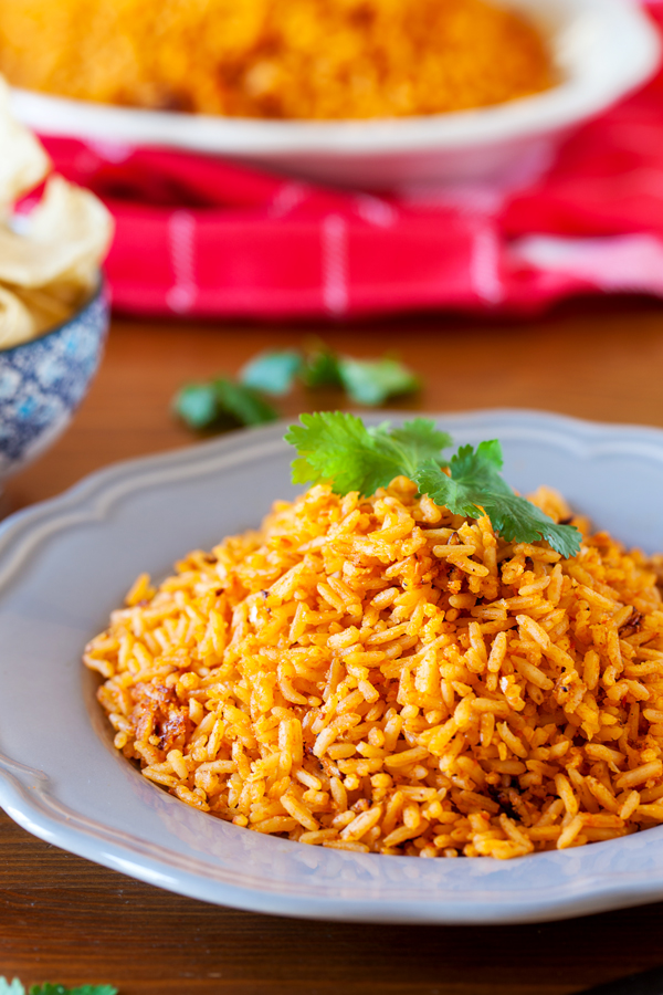 Authentic Restaurant Style Mexican Rice ready in 25 minutes! Or, 7 minutes when using my shortcut!