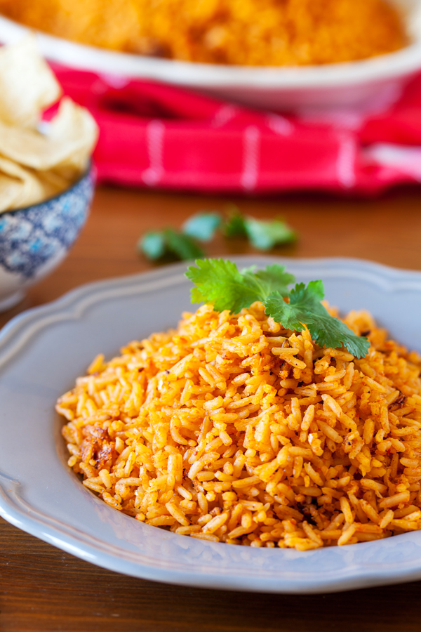 Restaurant Style Mexican Rice. Why settle for just a scoop as a side when you can make an entire pot of Mexican rice at home?