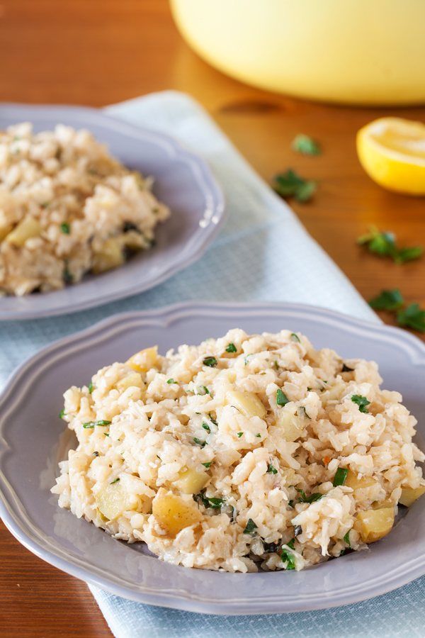 Creamy lemon chicken risotto without the fuss but all the flavors of tangy feta, briny olives, and freshly chopped herbs.