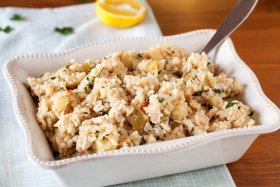 Creamy lemon chicken risotto without the fuss but all the flavors of tangy feta, briny olives, and freshly chopped herbs.