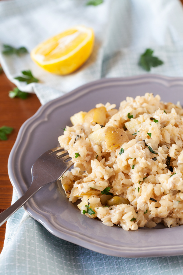 Creamy lemon chicken risotto without the fuss but all the flavors of tangy feta, briny olives, and freshly chopped herbs.