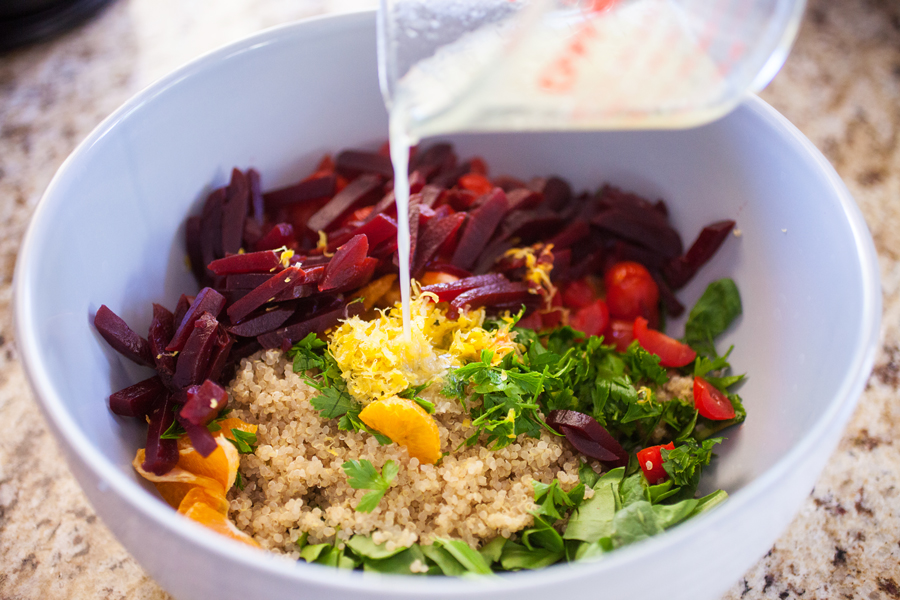 A bed of quinoa and spinach topped with a confetti of beets, mandarins, and tomatoes, this quinoa confetti salad is full of nutrients, vitamins, and fiber to make your meal that much healthier.