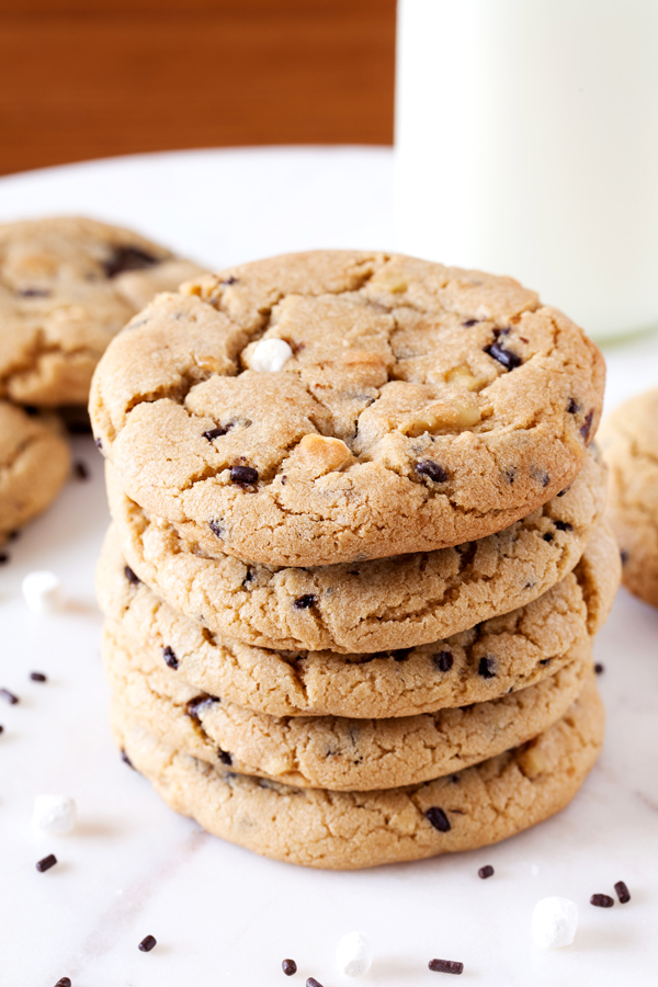 Rocky road reincarnated in cookie form. Full of marshmallows and walnuts, these rocky road cookies are soft, chewy, and gushing with rich ganache.