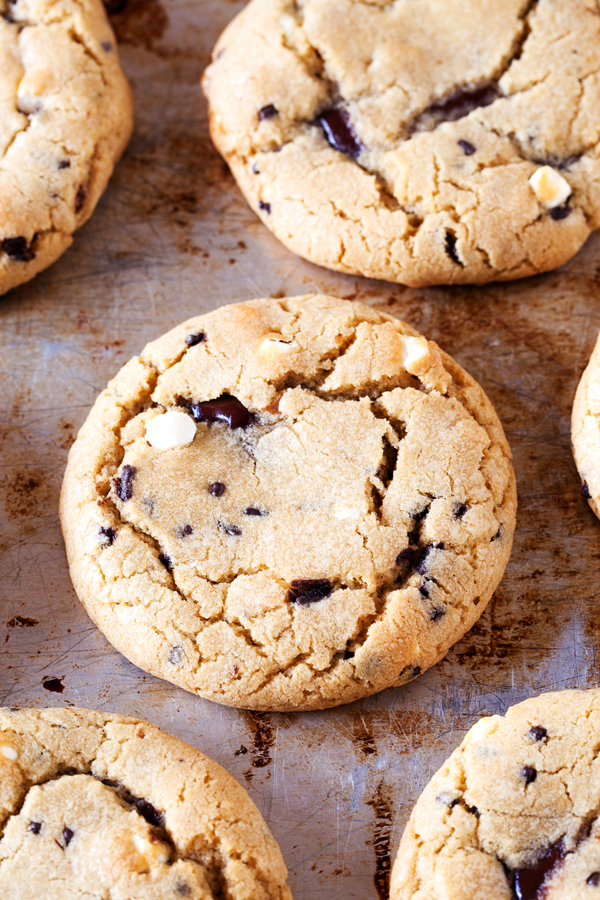 Rocky road reincarnated in cookie form. Full of marshmallows and walnuts, these rocky road cookies are soft, chewy, and gushing with rich ganache.