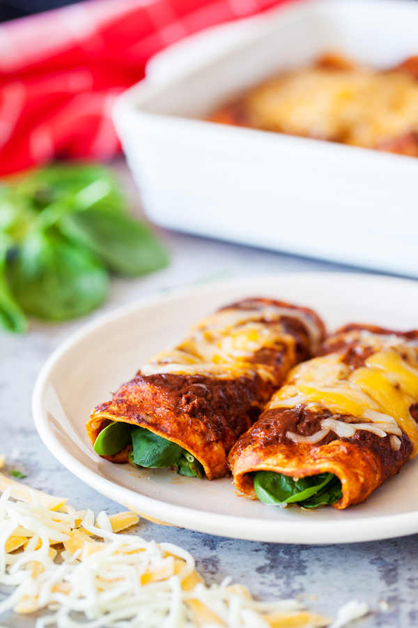 Spinach and cheese enchiladas are a healthier twist on a Mexican favorite.