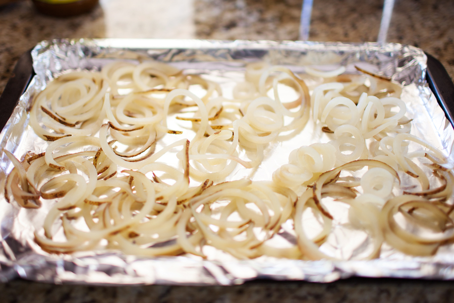 Crispy spiralized potato tossed in a taco seasoned sauce makes for a no-dressing-needed salad.