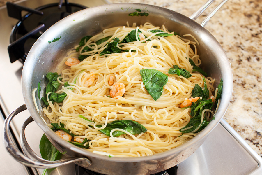 Talk about dinner on demand. This easy spicy shrimp pasta cooks in one pan, has only 5 ingredients, and cooks in 10 minutes!