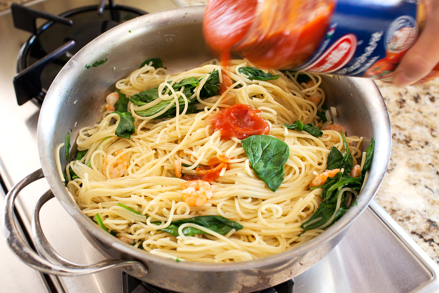 Talk about dinner on demand. This easy spicy shrimp pasta cooks in one pan, has only 5 ingredients, and cooks in 10 minutes!