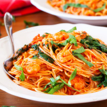 Talk about dinner on demand. This easy spicy shrimp pasta cooks in one pan, has only 5 ingredients, and cooks in 10 minutes!