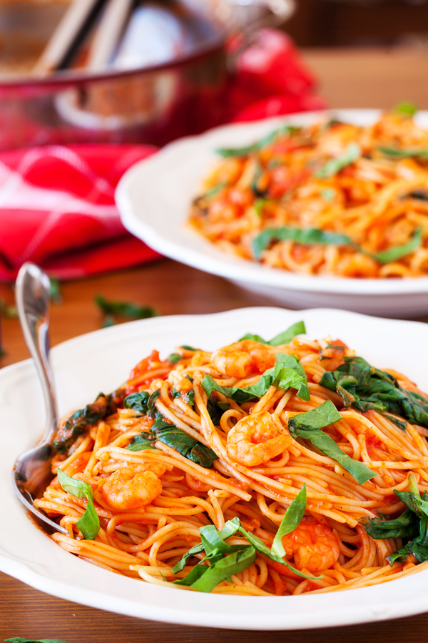 Talk about dinner on demand. This easy spicy shrimp pasta cooks in one pan, has only 5 ingredients, and cooks in 10 minutes!