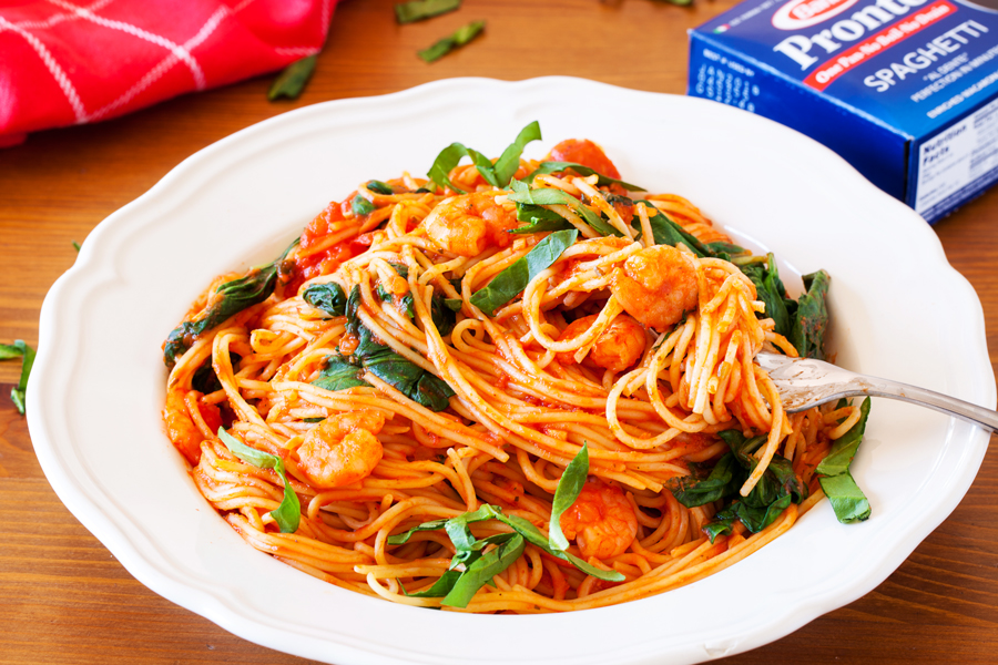 Talk about dinner on demand. This easy spicy shrimp pasta cooks in one pan, has only 5 ingredients, and cooks in 10 minutes!