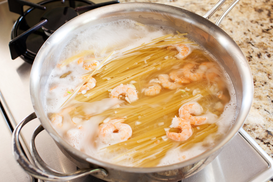 Talk about dinner on demand. This easy spicy shrimp pasta cooks in one pan, has only 5 ingredients, and cooks in 10 minutes!