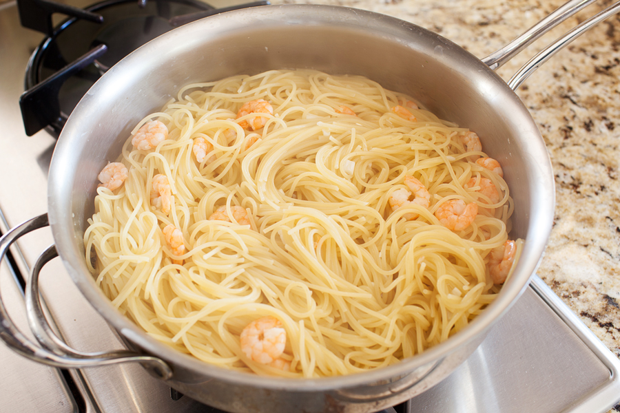 Talk about dinner on demand. This easy spicy shrimp pasta cooks in one pan, has only 5 ingredients, and cooks in 10 minutes!