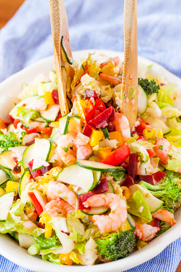 This shrimp chopped salad has it all. Plump and tender shrimp, a colorful medley of fresh veggies, and a bright and acidic dressing. Perfect as an accompaniment or a stand-alone meal. 