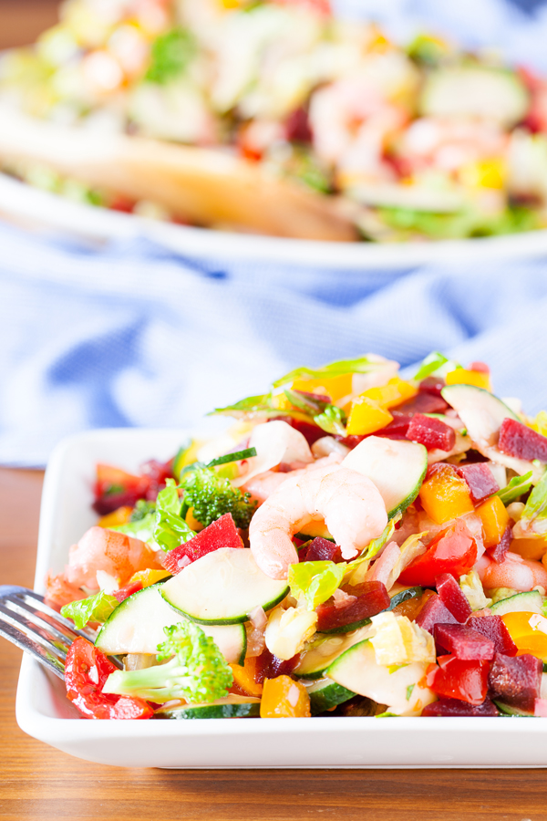 This shrimp chopped salad has it all. Plump and tender shrimp, a colorful medley of fresh veggies, and a bright and acidic dressing. Perfect as an accompaniment or a stand-alone meal. 