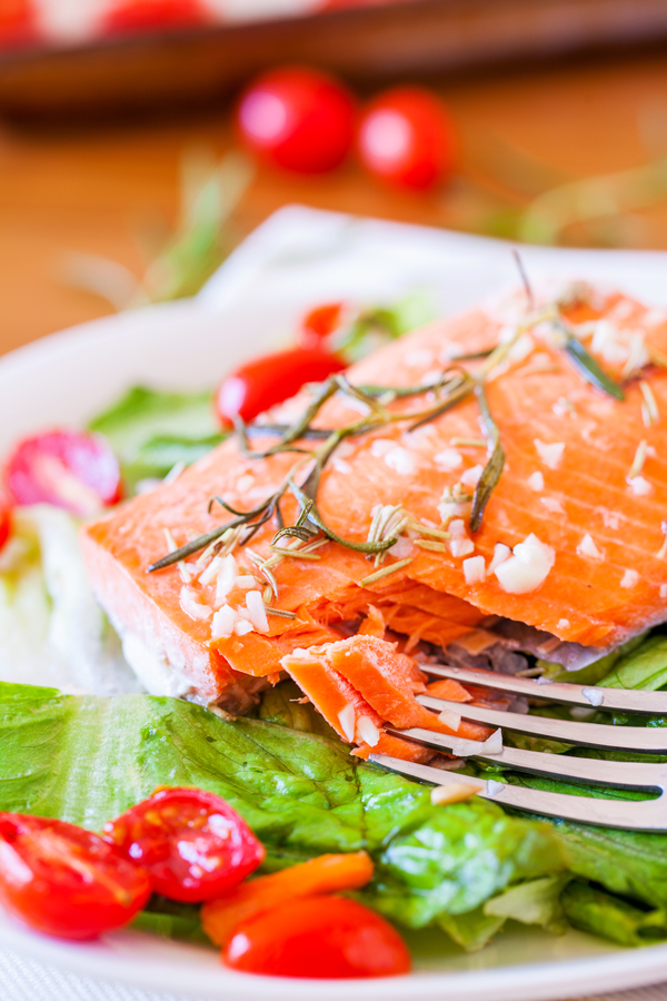 Spa quality Baked Salmon with Rosemary Vinaigrette and Roasted Tomatoes is light, mild, aromatic and ready in 20 minutes!