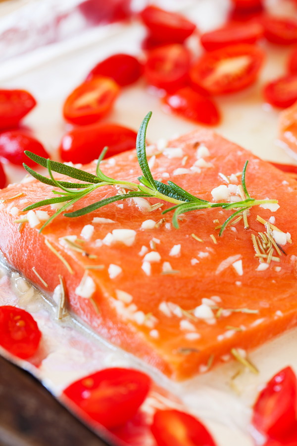 Spa quality Baked Salmon with Rosemary Vinaigrette and Roasted Tomatoes is light, mild, aromatic and ready in 20 minutes!