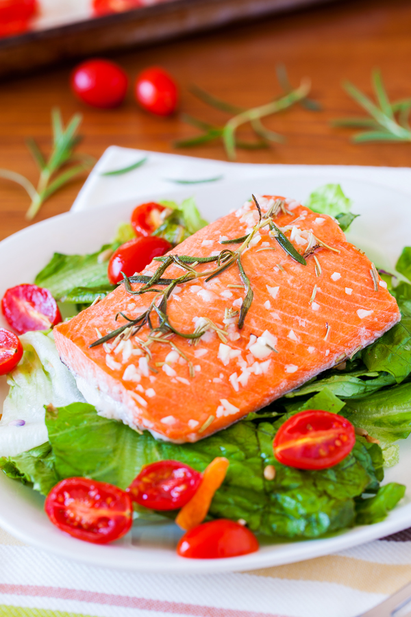 Spa quality Baked Salmon with Rosemary Vinaigrette and Roasted Tomatoes is light, mild, aromatic and ready in 20 minutes!