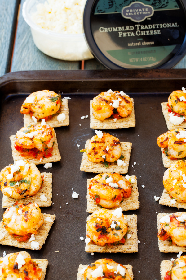 Grilled Mediterranean shrimp atop a crispy TRISCUIT cracker, sprinkled with tangy feta and dolloped with Kalamata olive aioli make these Mediterranean Shrimp Bites the perfect off-the-grill summer appetizer. 