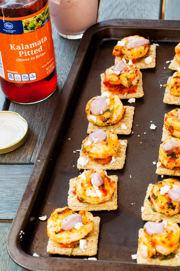Grilled Mediterranean shrimp atop a crispy TRISCUIT cracker, sprinkled with tangy feta and dolloped with Kalamata olive aioli make these Mediterranean Shrimp Bites the perfect off-the-grill summer appetizer. 