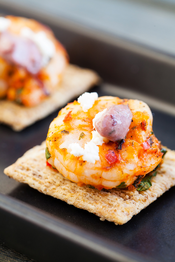 Grilled Mediterranean shrimp atop a crispy TRISCUIT cracker, sprinkled with tangy feta and dolloped with Kalamata olive aioli make these Mediterranean Shrimp Bites the perfect off-the-grill summer appetizer. 