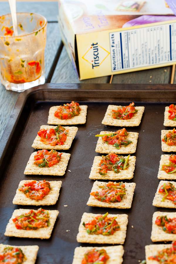 Grilled Mediterranean shrimp atop a crispy TRISCUIT cracker, sprinkled with tangy feta and dolloped with Kalamata olive aioli make these Mediterranean Shrimp Bites the perfect off-the-grill summer appetizer. 