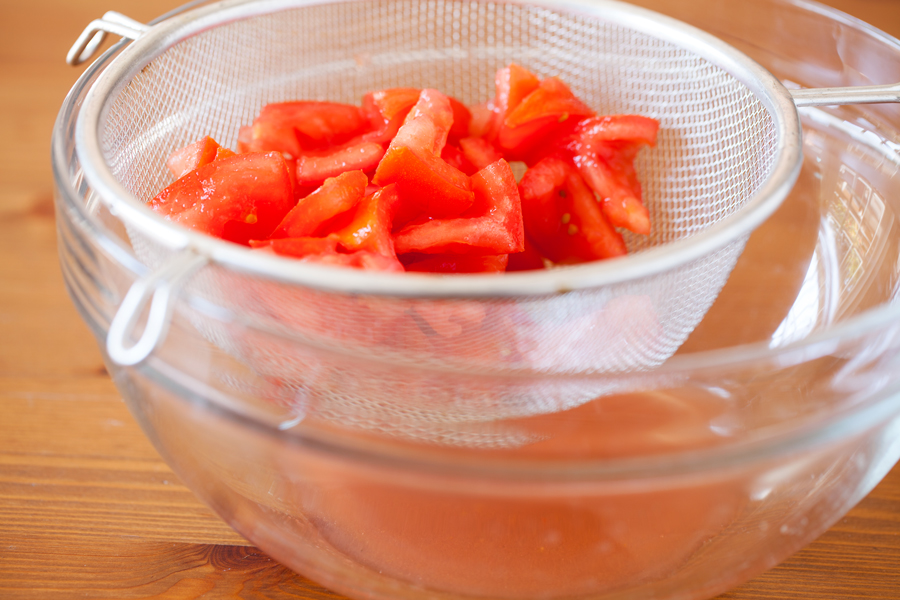 For a hefty side or a light main dish, this Panzanella is fresh and flavorful to accommodate even the pickiest eaters. Made from pre-toasted baguette cubes to prevent water-log, the cubes become softened yet maintain some chew in the fresh tomato juice-based vinaigrette.