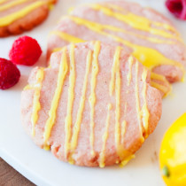 Made from fresh raspberry puree and lemon juice, these Raspberry Lemonade Cookies are perfect for your cookie jar and summer potlucks.