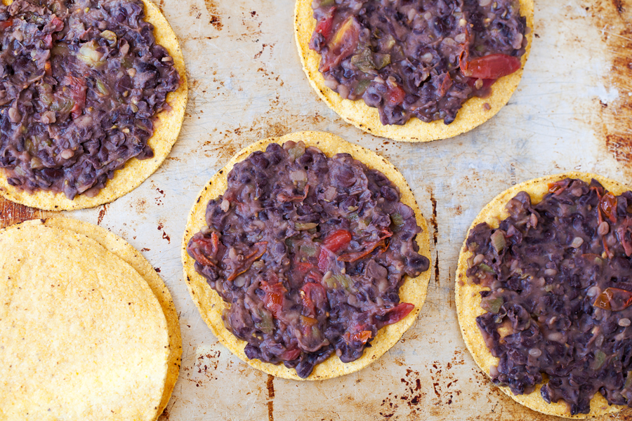 These spicy chicken tostadas are so easy and can be thrown together in minutes for a no-planning-involved Cinco de Mayo celebration or a twist on taco nights.