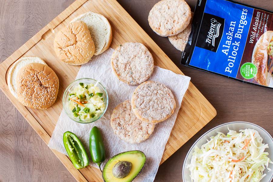 These Alaskan Pollock Burgers with Pineapple and Jalapeño Slaw are a healthy alternative to a regular burger yet just as delicious as an item on the menu of a gourmet burger restaurant.