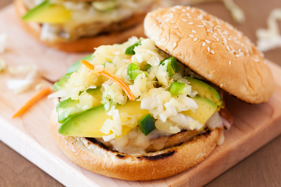 These Alaskan Pollock Burgers with Pineapple and Jalapeño Slaw are a healthy alternative to a regular burger yet just as delicious as an item on the menu of a gourmet burger restaurant.