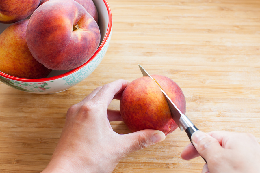 Learn how to achieve perfect peach slices for use in these Baked Peaches Breakfast Toasts and all of your favorite peach recipes.