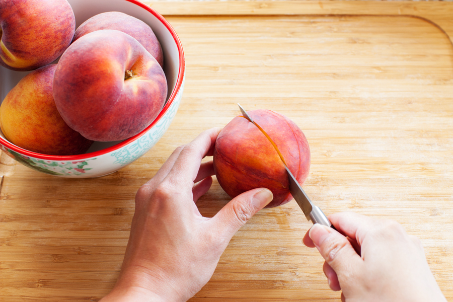 Learn how to achieve perfect peach slices for use in these Baked Peaches Breakfast Toasts and all of your favorite peach recipes.