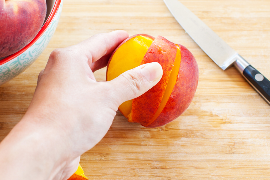 Learn how to achieve perfect peach slices for use in these Baked Peaches Breakfast Toasts and all of your favorite peach recipes.