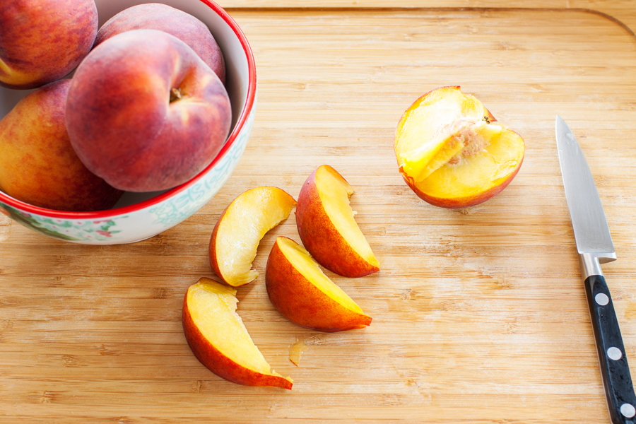 Learn how to achieve perfect peach slices for use in these Baked Peaches Breakfast Toasts and all of your favorite peach recipes.