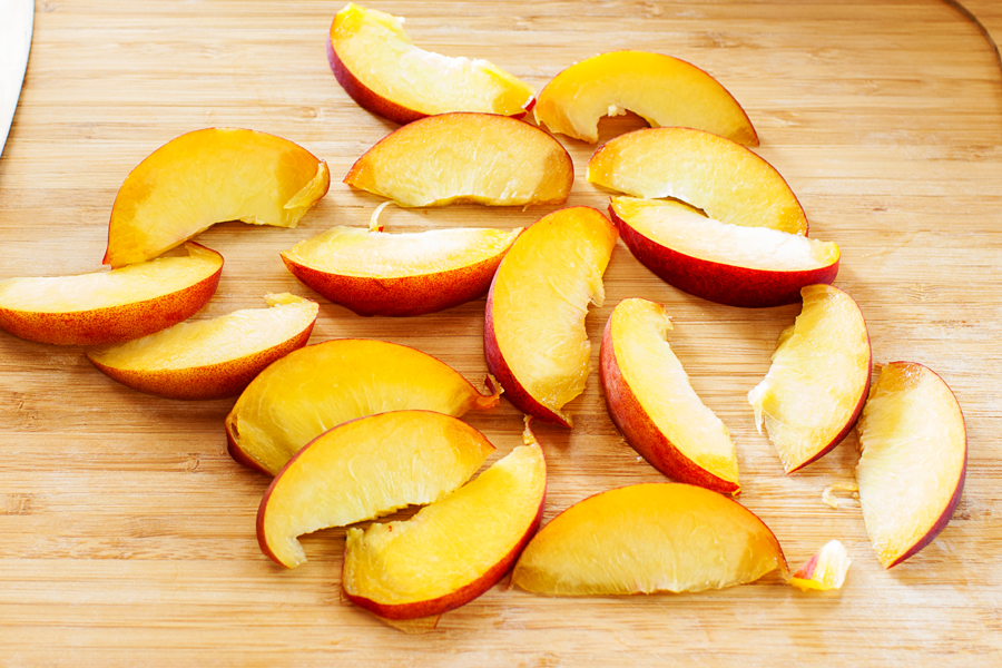 Learn how to achieve perfect peach slices for use in these Baked Peaches Breakfast Toasts and all of your favorite peach recipes.