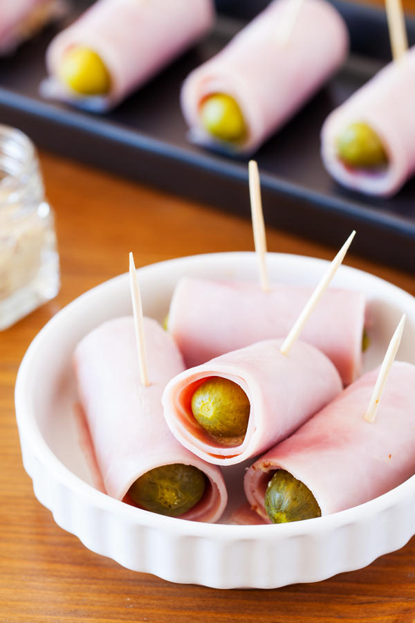 Ham Wrapped Cornichons are salty, sour, and crunchy. Made with only three ingredients, they make the perfect appetizer or game day snack!