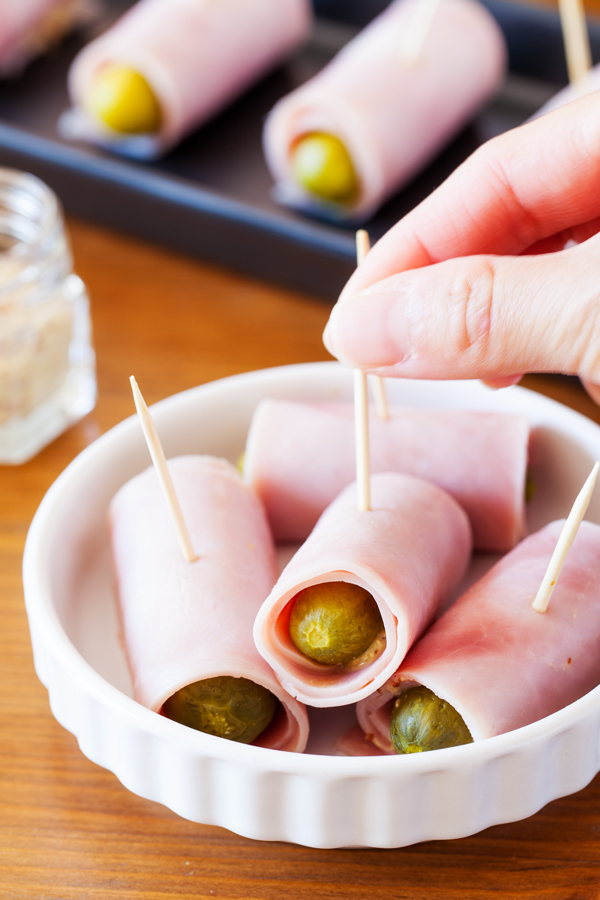 Ham Wrapped Cornichons are salty, sour, and crunchy. Made with only three ingredients, they make the perfect appetizer or game day snack!
