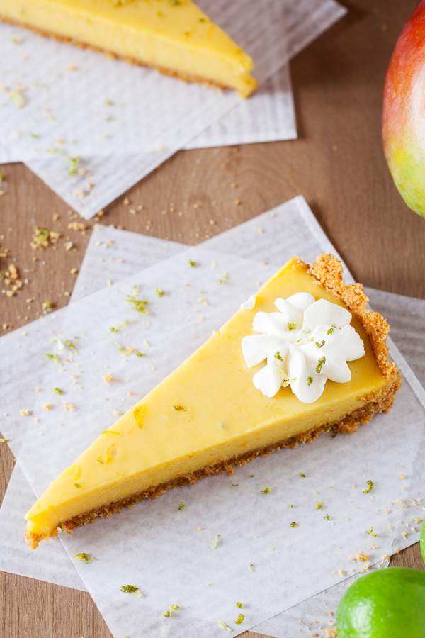 In this Mango Key Lime Tart, mango and key lime work together to create a sweet and sour, custard-like filling that sits atop a buttery graham cracker crust. The perfect dessert for summer BBQ’s, potlucks, and get-togethers.