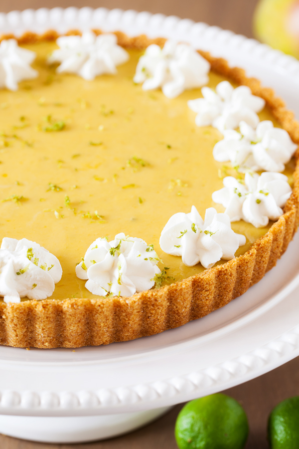 In this Mango Key Lime Tart, mango and key lime work together to create a sweet and sour, custard-like filling that sits atop a buttery graham cracker crust. The perfect dessert for summer BBQ’s, potlucks, and get-togethers.