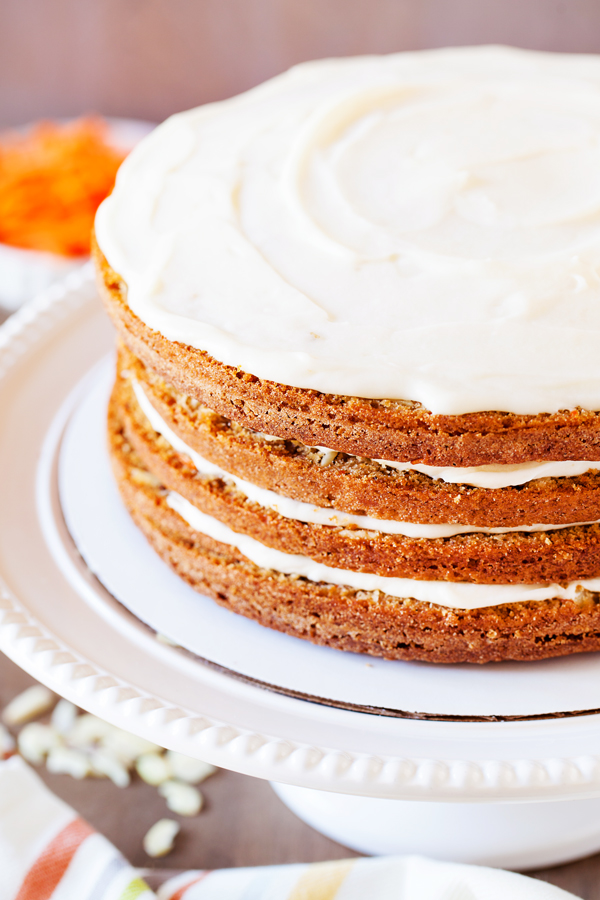 The addition of a secret ingredient makes this 4-Layer Moist Carrot Cake irresistible and addicting!