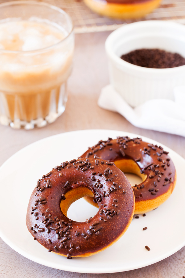 These Baked Mocha Doughnuts have an espresso cake doughnut base with a layer of smooth mocha glaze that will make your kitchen smell divine and any coffee lover’s taste buds go wild!