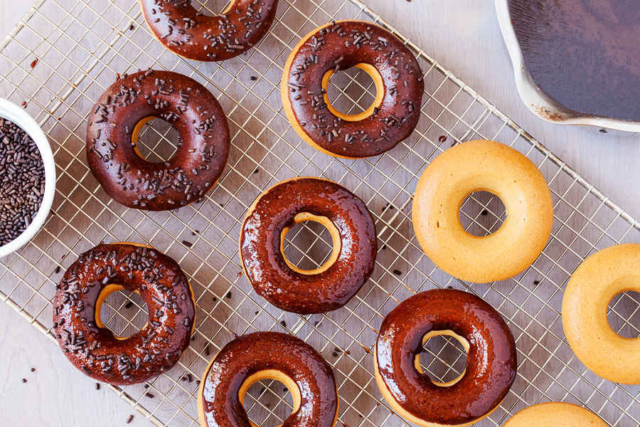 These Baked Mocha Doughnuts have an espresso cake doughnut base with a layer of smooth mocha glaze that will make your kitchen smell divine and any coffee lover’s taste buds go wild!