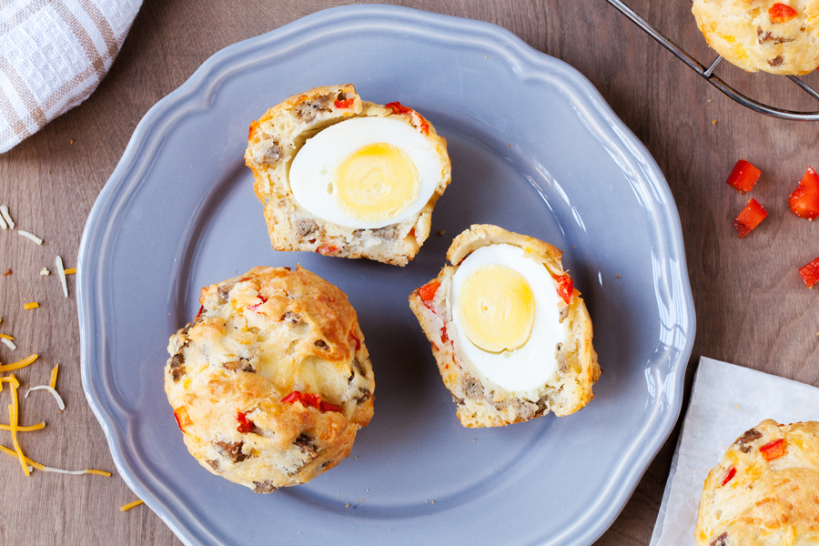 These Breakfast Sausage & Egg Muffins come with a surprise boiled egg inside and can be made ahead so you have breakfast at the ready for the entire week!